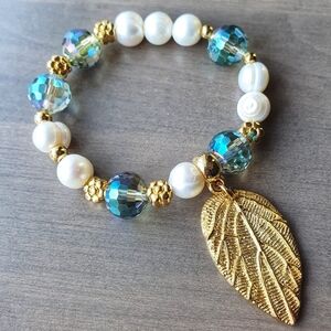 Gold and Blue Beaded Bracelet with Leaf Charm